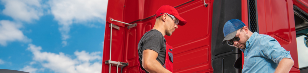 Driver talking to a mechanic worrying about the cost of downtime